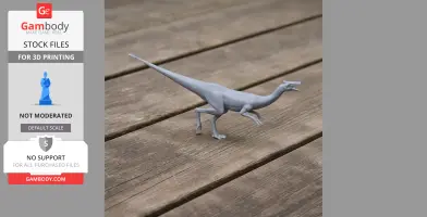 Gray 3D-printed model of a Pelecanimimus dinosaur, posed walking on a wooden surface.