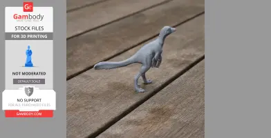 A gray 3D-printed Philovenator dinosaur model standing on a wooden surface.