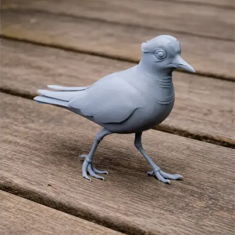 A 3D-printed model of a prehistoric bird, resembling a plover, on a wooden surface.