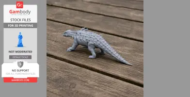 A 3D printed Polacanthus model with spiky armor, placed on a wooden surface.