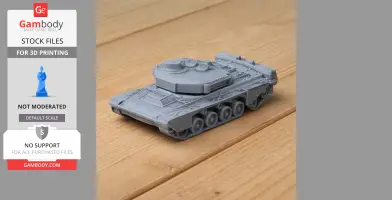 Gray 3D-printed model of Challenger 1 tank on wooden surface.