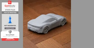 Gray 3D-printed model of Artega GT car on a wooden surface.