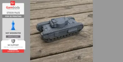 3D-printed Churchill tank model on wooden surface, featuring detailed tracks and turret.