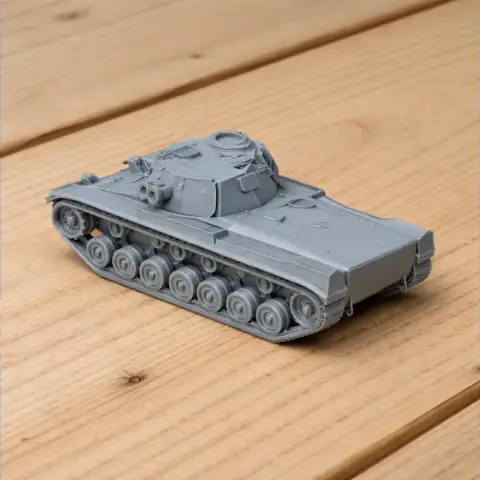 Gray 3D-printed tank model with detailed tracks and turret, displayed on a wooden surface.