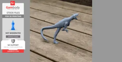 A 3D printed model of a dinosaur-like creature, Raptorex, posed on a wooden surface.