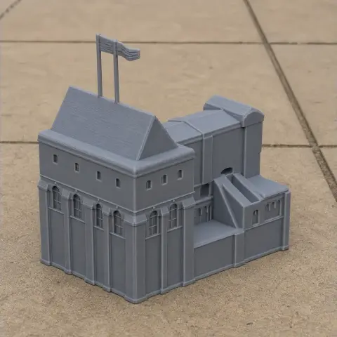 Gray 3D-printed model of Castle Rising, featuring detailed stonework and flags.