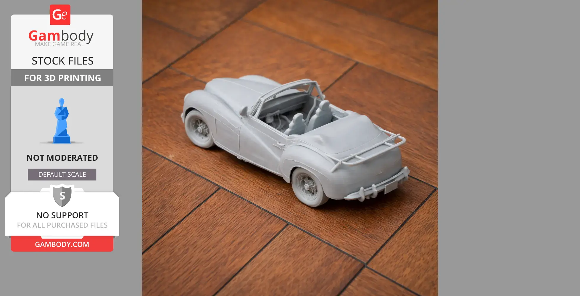 3D printed Aston Martin 2-Litre Sports model in gray, displayed on wooden surface.