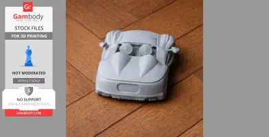 3D printed model of Aston Martin CC100 on a wooden floor.