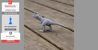 Gray 3D-printed Sinotyrannus model on a wooden surface. Appears detailed and slightly armored.