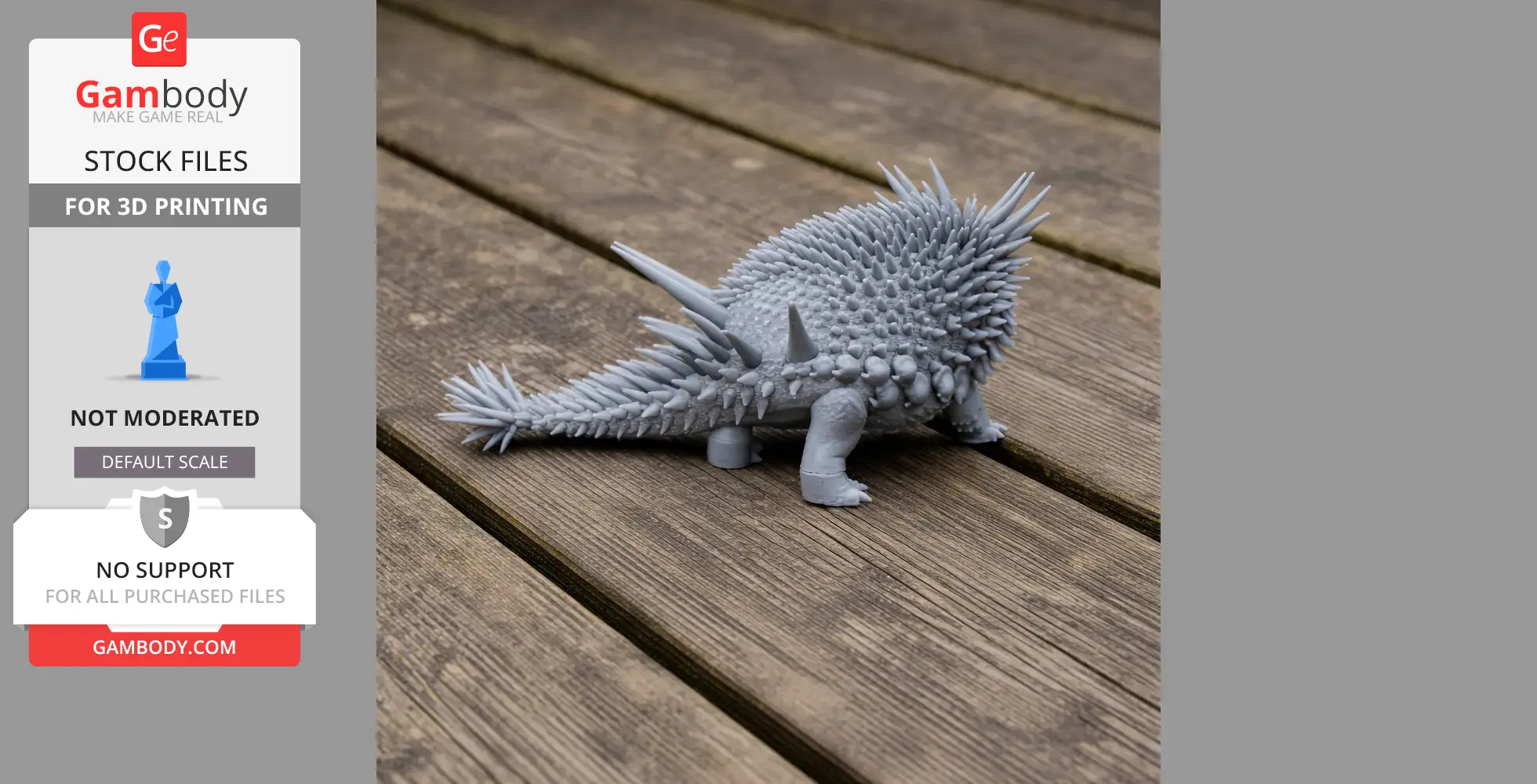 Gray, spiky 3D-printed model of Spicomellus, a prehistoric armored animal, on wooden planks.