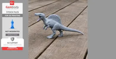 Gray 3D-printed Spinosaurus model with a sail-like spine, standing on wooden planks.
