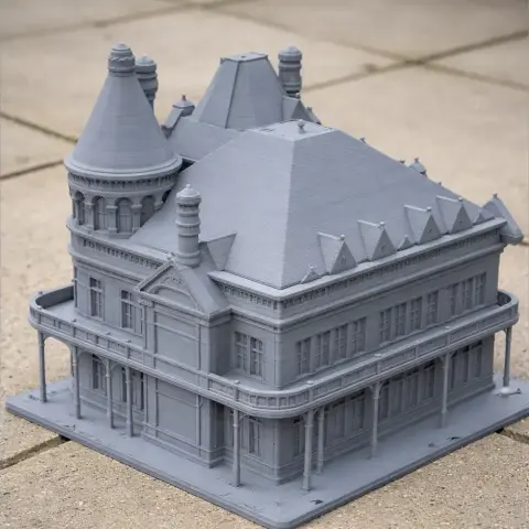 Intricate 3D-printed model of Gresham Castle with detailed towers and roof.