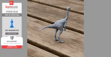 Gray Struthiomimus 3D print model on wooden surface, viewed from the side.
