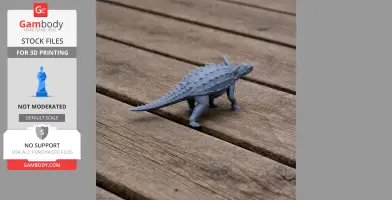 3D-printed Struthiosaurus model with spiked back, standing on wooden surface.