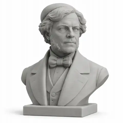 Bust of a man with curly hair, wearing a suit and bow tie, on a rectangular base.