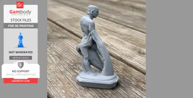 A 3D-printed model of an ancient warrior holding a draped cloth, standing on a wooden surface.