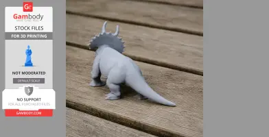 3D printed triceratops model on a wooden surface, viewed from behind.
