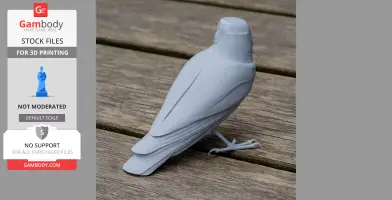 Gray 3D-printed model of a bird with detailed feathers, standing on wooden surface.