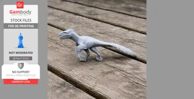 A detailed 3D-printed Utahraptor model standing on wooden planks.