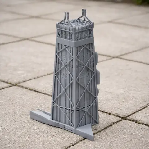 A 3D-printed model of a skyscraper with crisscrossing beams stands on a tiled surface.