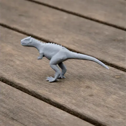 Gray 3D-printed model of a Veterupristisaurus dinosaur on a wooden surface.