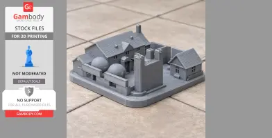 Miniature gray 3D-printed architectural model with houses and cylindrical structures on a base plate.