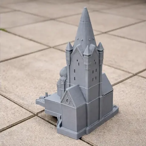 3D-printed gray model of Paderborn Cathedral, featuring tall spires and intricate architecture.