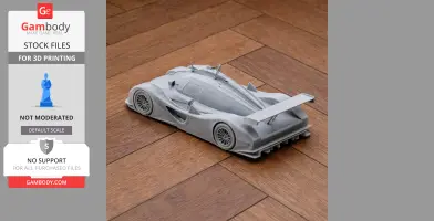 Gray 3D-printed Audi R8C model car on a wooden floor.
