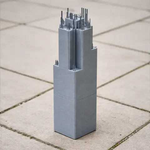 3D-printed model of the Sears Tower, with detailed spires, on a tiled surface.