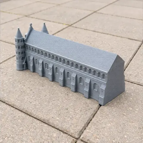 3D printed model of St Albans Cathedral with detailed architectural features on a tiled surface.