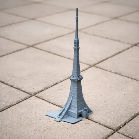 Gray 3D-printed model of a tall, slender tower with a wide base, resembling modern architecture.