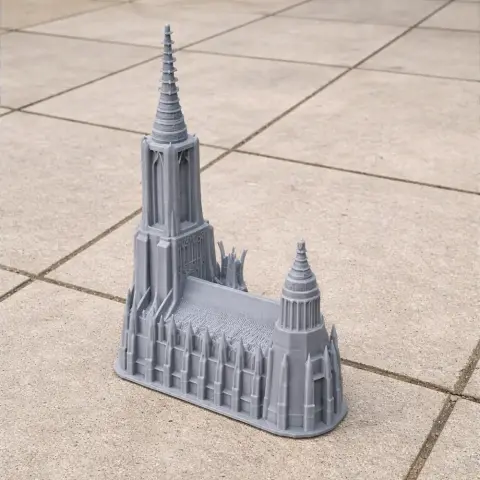 Miniature 3D-printed model of Ulm Minster with detailed spires and gothic architecture.