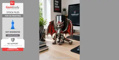 A mechanical dragon figurine with red wings sits on a desk near a computer.