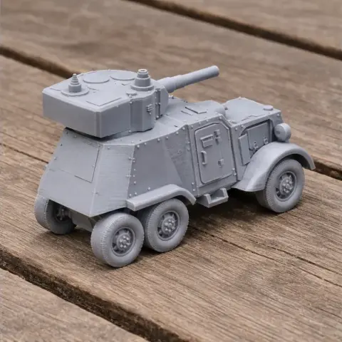 Gray 3D-printed model of an armored, wheeled tank with a turret and detailed surface textures.