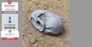 3D printed Ankistrodon skull replica in gray, placed on a textured soil surface.