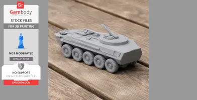 3D-printed model of a tank with eight wheels and a turret, displayed on a wooden surface.
