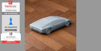 3D printed model of a Bizzarrini Manta car on a wooden floor.