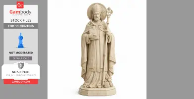 A detailed statue of a saint with a halo, holding a staff and a book, dressed in robes.