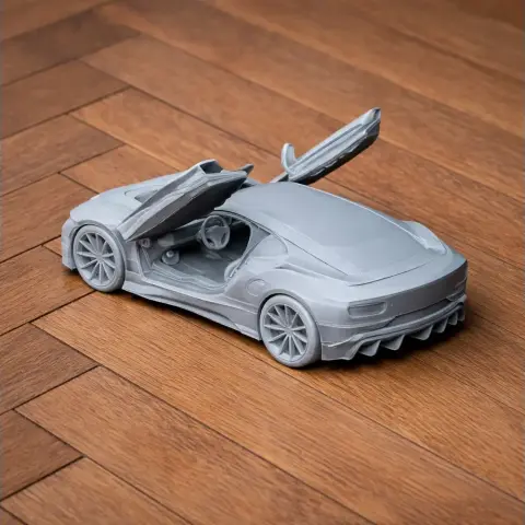 3D-printed BMW i8 model with open gull-wing doors on wooden floor.