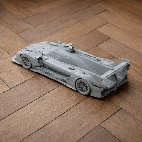 3D printed model of a sleek sports car with aerodynamic design on a wooden surface.