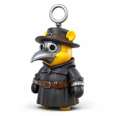 Yellow bear in plague doctor costume with ring loop on hat.