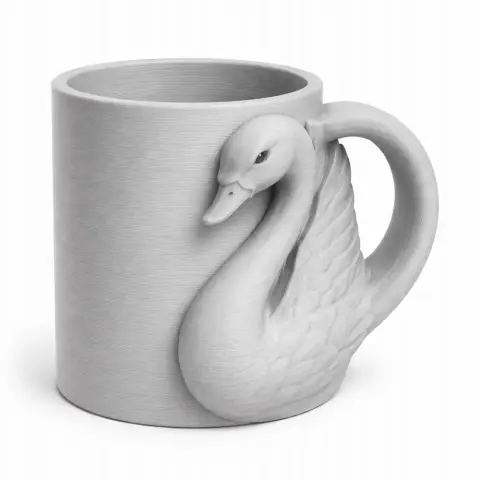 A 3D-printed mug with a swan-shaped handle integrated into the design.