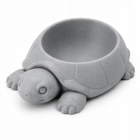 3D model of a turtle-shaped bowl with detailed shell and limbs for 3D printing.