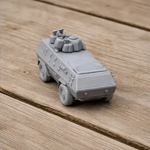 Gray 3D printed Al-Fahd Infantry Fighting Vehicle model on wooden surface.