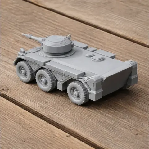 Detailed 3D-printed model of a tank with six wheels on a wooden surface.