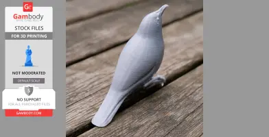 3D printed model of a bird with fine details, perched on a wooden surface.