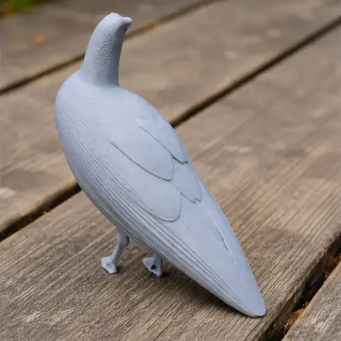3D printed model of Andean coot with detailed feathers on a wooden surface.