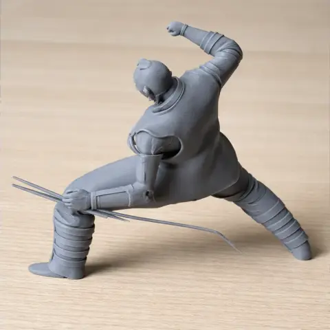 Dynamic 3D-printed figure in action pose, armored with bladed extensions, inspired by Cyberpunk 2077.
