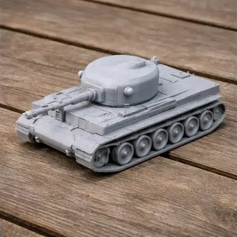Gray 3D-printed model of a tank with turret and tracks on a wooden surface.