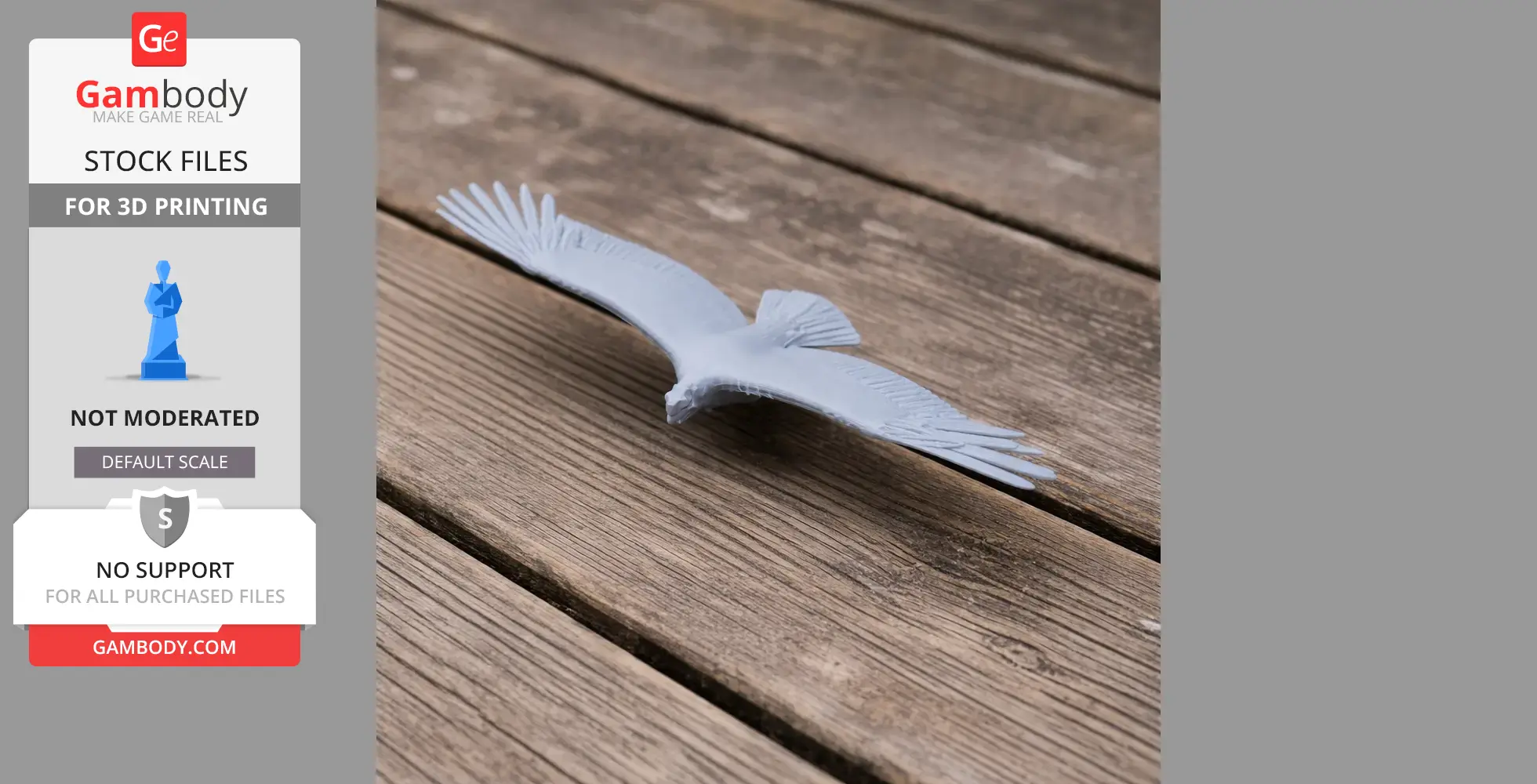 A 3D printed model of a bird with outstretched wings, placed on a wooden surface.
